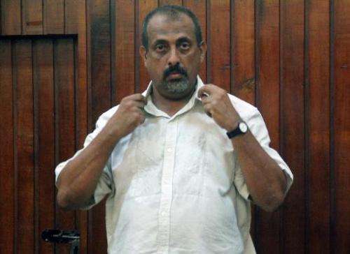 Kenyan national Feisal Mohammed Ali stands in the dock at a Mombasa court on December 24, 2014