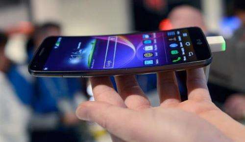LG G-Flex smartphone is seen on display during the 2014 International CES, at the Las Vegas Convention Center, Nevada, on Januar