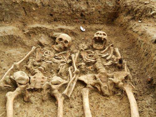 ‘Lost chapel’ skeletons found holding hands after 700 years