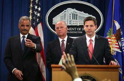 L-R: US Attorney General Eric Holder, US Attorney for Western District of Pennsylvania David Hickton, and Assistant Attorney Gen
