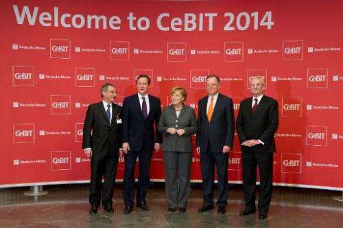 (L to R) President of BITKOM Dieter Kempf, British Prime Minister David Cameron, German Chancellor Angela Merkel, State Premier 