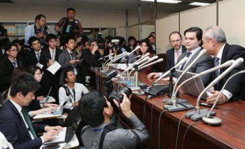 Mark Karpeles (2nd R), president of MtGox Bitcoin exchange, speaks during a press conference in Tokyo on February 28, 2014