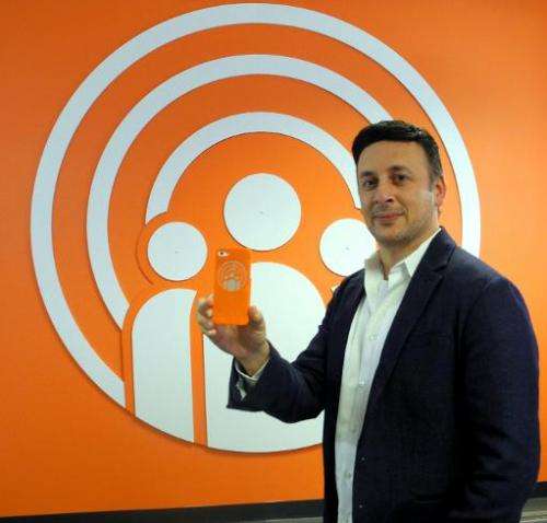 Michael Chasen, founder and chief executive of SocialRadar, poses in his offce in Washington, DC, on January 24, 2014