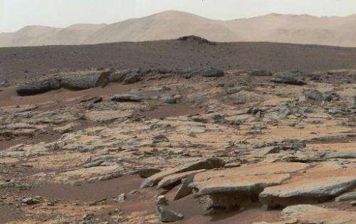 Mosaic of images from NASA's Curiosity Mars rover released December 9, 2013 shows a series of sedimentary deposits in the Glenel