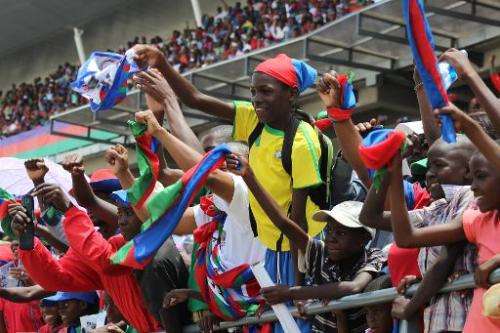 Namibian Ruling party South West Africa People Organization (SWAPO) supporters cheer during the last General Election campaign r