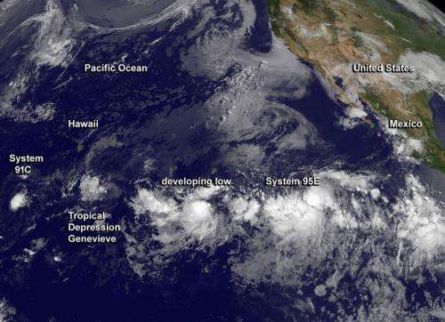 NASA sees Genevieve squeezed between 3 tropical systems