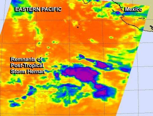 NASA sees warmer cloud tops as Tropical Storm Hernan degenerates