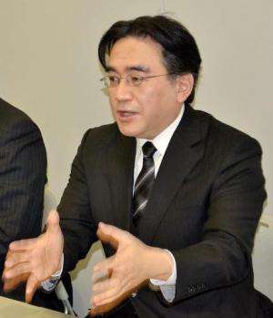 Nintendo President Satoru Iwata speaks during a press conference in Osaka, on January 17, 2014