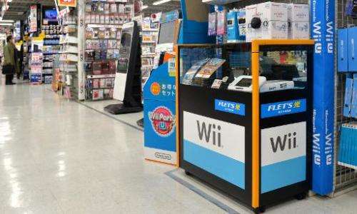 Nintendo's video game console Wii U is displayed at an electronics shop in Tokyo on January 20, 2014