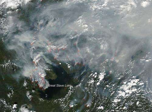 Northwest Territories on fire and smoke drifts over Labrador Sea
