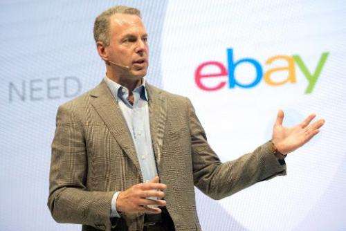 Online commerce giant eBay President Devin Wenig speaks during a press conference in Berlin on September 26, 2013