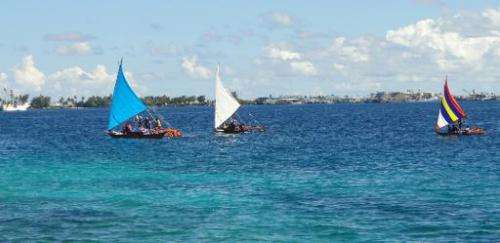 Outrigger canoes are shown near the Marshall Island's capital  Majuro on September 3, 2013