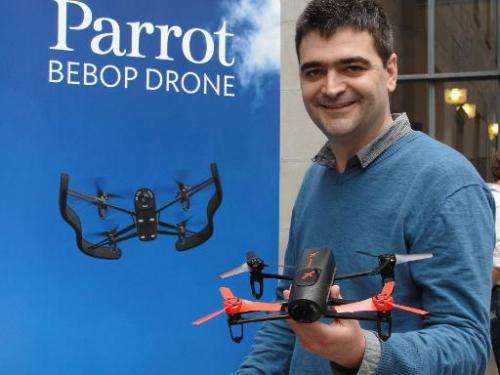 Parrot product manager Francois Callou shows off a Bebop Drone in San Francisco on May 8, 2014