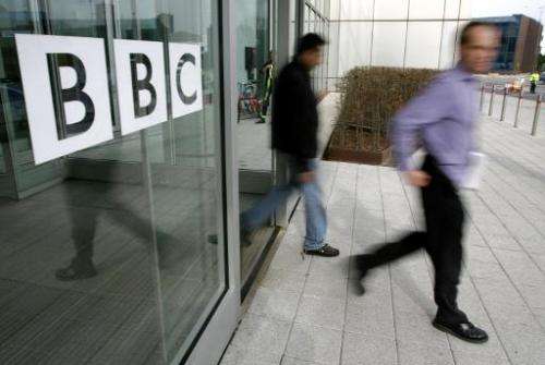 People leave the BBC building in West London on March 21, 2005