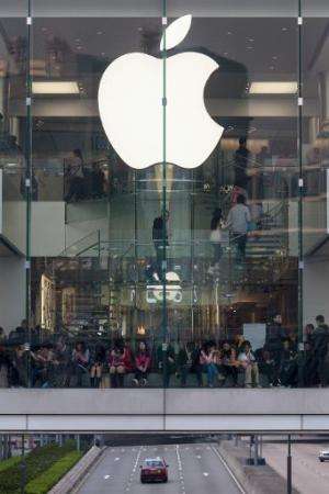 People shop at an Apple store in Hong Kong, on December 25, 2013