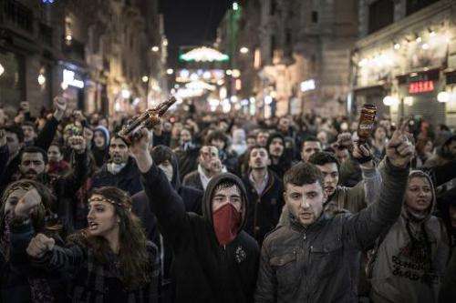 Protesters chant slogans against newly proposed restrictions on the use of the Internet and against the Turkish government durin