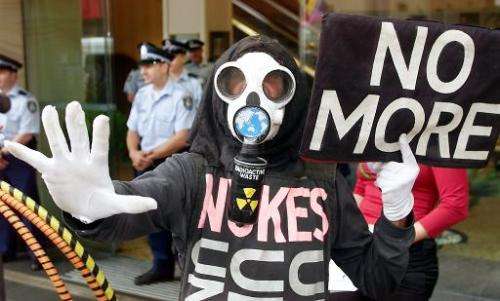 Protesters make their feelings known outside the Conference on Nuclear Science and Engineering in Sydney, October 24, 2001
