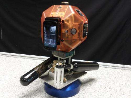 Prototype robot with smartphone to test 3-D mapping, navigation inside space station