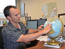 Researcher observes temperature variability across the world