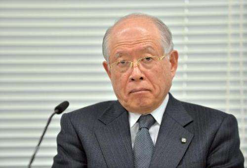 Riken institute head Ryoji Noyori listens to questions during a press conference in Tokyo on March 14, 2014