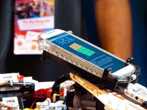 Robot solves Rubik's Cube in record time at Birmingham fair