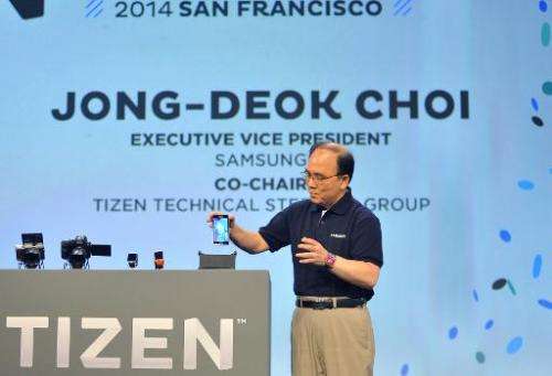 Samsung Executive Vice President Jong-Deok Choi displays the first Tizen Smartphone at the Tizen Developer Conference in San Fra