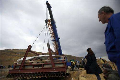 Serbia experts use heavy machinery to move mammoth