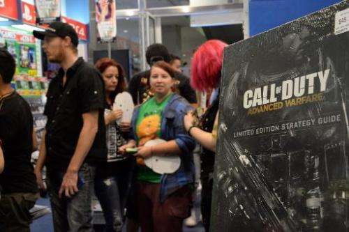 Shoppers queue for the newest instalment of the &quot;Call of Duty&quot; videogame ahead of the midnight launch of pre-ordered c
