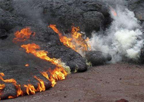 Slow-moving lava hits first house in Hawaii town