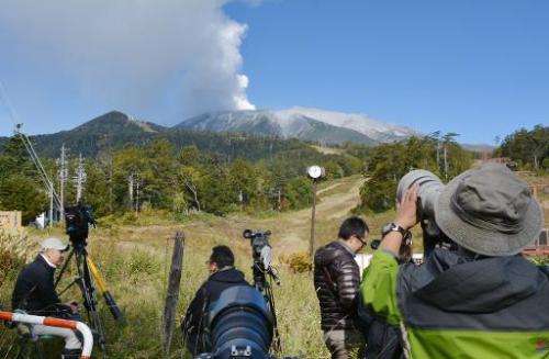 Smoke can be seen billowing from Mount Ontake in Nagano, Japan, on September 28, 2014