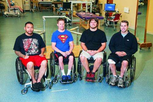 Spinal stimulation helps 4 patients with paraplegia regain voluntary movement