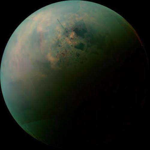 Success! Cassini flies by Titan, collects intel on mysterious lakes