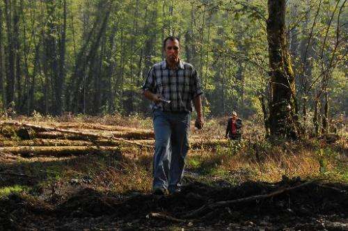 Suren Gazaryan, of the Environmental Watch on North Caucasus, walks in a forest close to the 2014 Olympics construction site nea