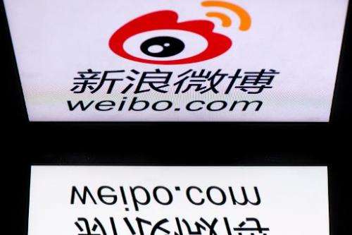 The chinese app Weibo's logo is displayed on a tablet on January 2, 2014 in Paris