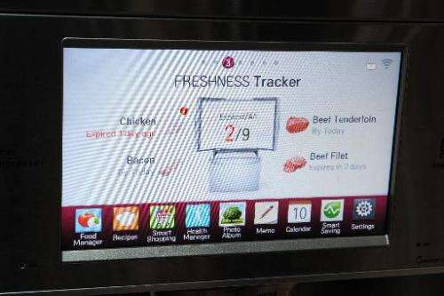 The display embedded in the front of a LG smart refrigerator on the final day of the 2014 International CES, January 10, 2014 in
