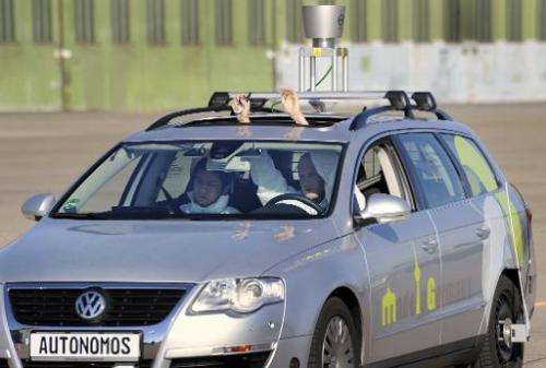 The driverless car &quot;Made in Germany&quot; (MIG) is put through its paces at Berlin's disused Tempelhof airport, on October 