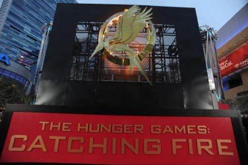 The flaming logo for the Los Angeles premiere of &quot;The Hunger Games: Catching Fire&quot; is seen at the Nokia Theatre LA Liv