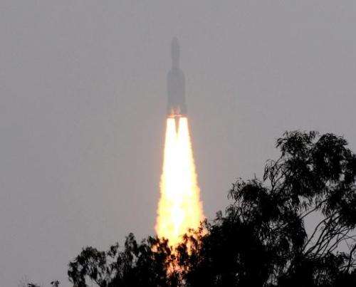 The Geostationary Satellite Launch Vehicle (GSLV) Mk-III rocket lifts off from The Satish Dhawan Space Centre on Sriharikota Isl