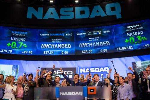 The GoPro team celebrates during the company's initial public offering (IPO) at the Nasdaq Stock Exchange on June 26, 2014 in Ne