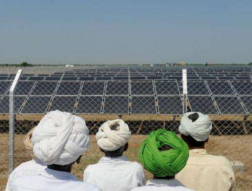 The inauguration of a solar farm in Gunthawada village, Banaskantha district, in India's Gujarat state on October 14, 2011