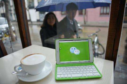 The logo of Chinese popular instant messaging platform called WeChat on a mobile device on March 12, 2014