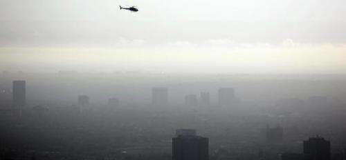 The Obama administration announces environmental regulations to curb emissions of ozone, a smog-causing polluant, responsible fo