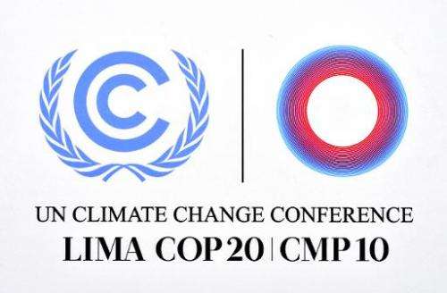 The official logo of the UN COP20 and CMP10 climate change conferences, on display at the venue in Lima, on December 5, 2014
