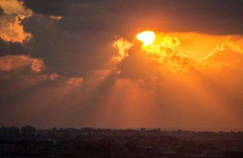 The sun setting over the Gaza strip on July 19, 2014