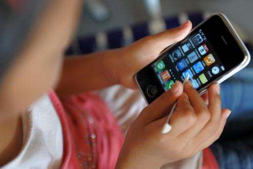 The World Health Organisation has called for research into the effects of mobile phone usage on young people