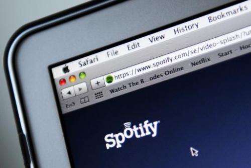 The world's biggest music streaming service, Spotify, announced its revenue grew by 74 percent in 2013 while net losses shrank b