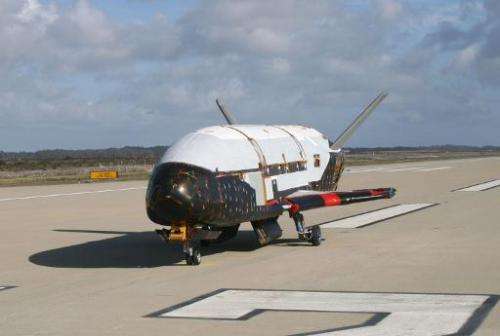 This April 4, 2010, file photo provided by the US Air Force shows the X-37B spacecraft, which is expected to land this week afte