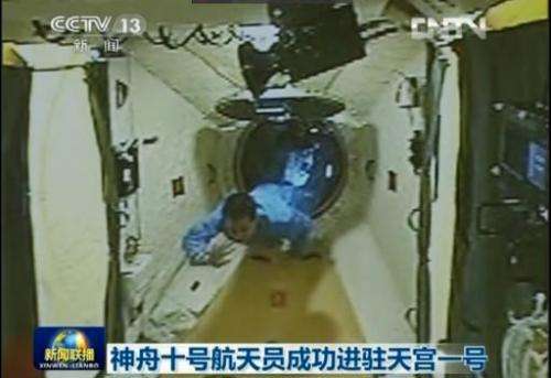 This frame grab taken from China Central Television (CCTV) on June 13, 2013 shows a scene broadcast of Chinese astronaut Nie Hai