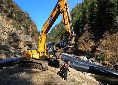 This picture taken on November 2, 2011 shows an excavator working in the bed of a stream in a protected area of the European Nat