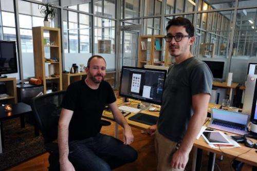 Thomas Gayno (R) and Jeff Baxter,  two former Google employees, develop their mobile voice messaging app, Cord, at their office 